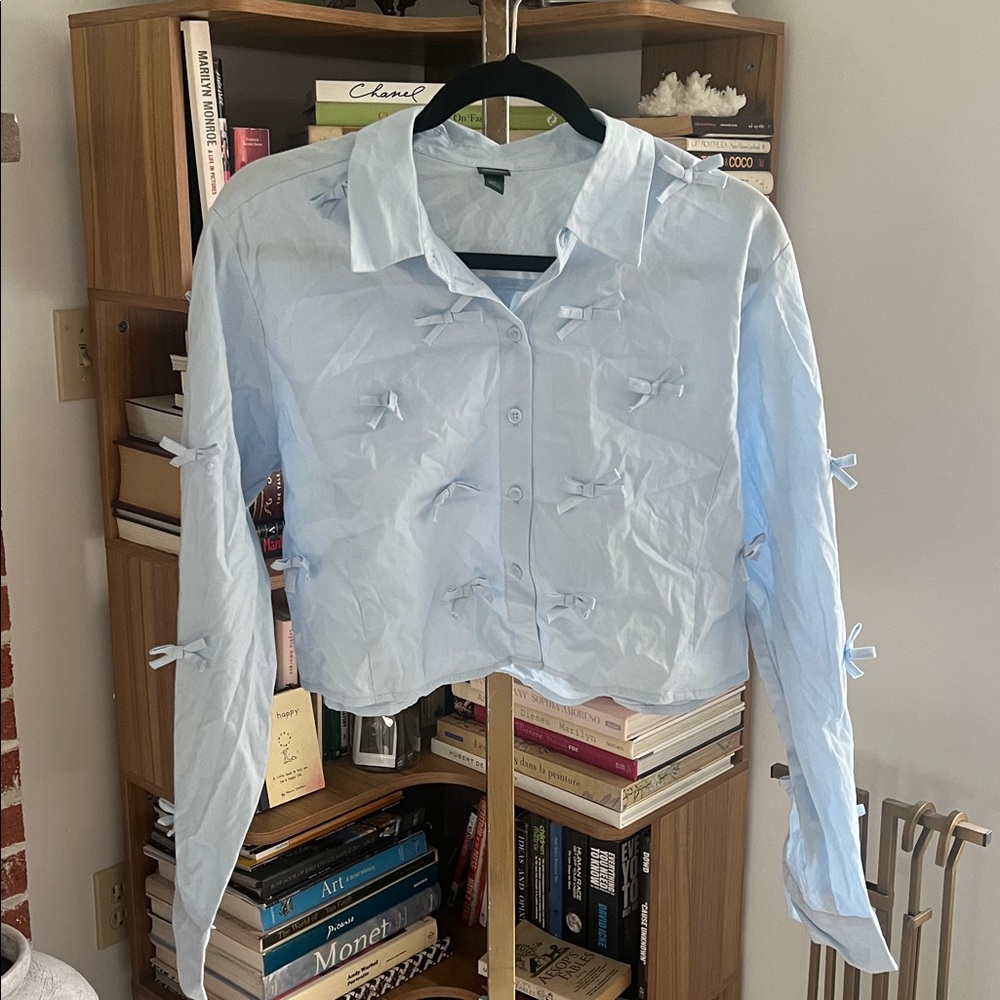 Light Blue Button-Up Shirt with Bow Accents